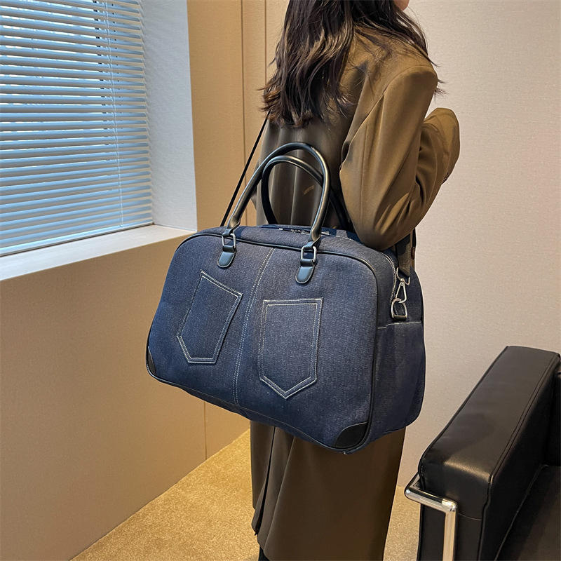 Denim travel bag side view lightweight fabric