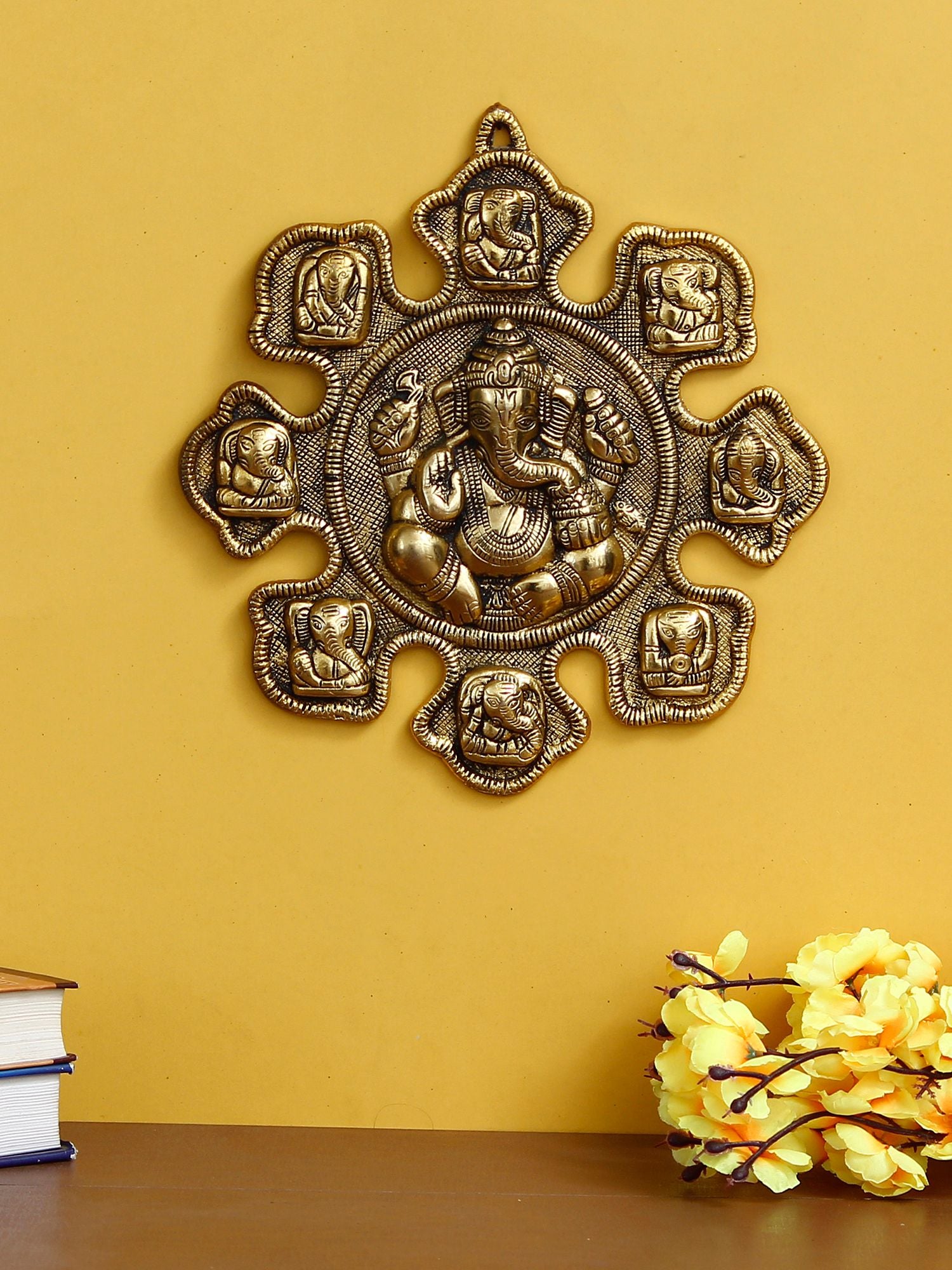 eCraftIndia 9 variants of Lord Ganesha Golden Metal Wall hanging